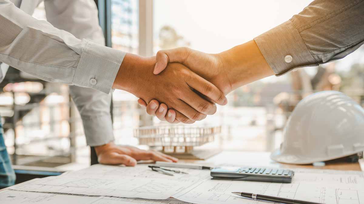 Two people having a good firm handshake 