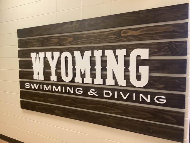 Corbett Pool Renovation – University of Wyoming Sign That Says "Wyoming Swimming and Diving"
